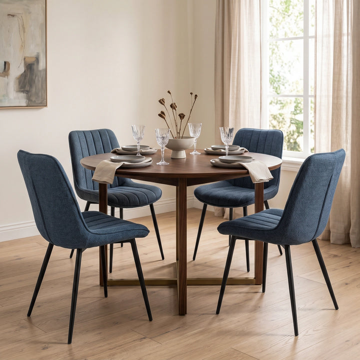 [Blue | Set of 4] Four fabric dining chairs around a round table in a bright dining room