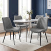 [Grey | Set of 4] Four fabric dining chairs around a round table in a room with a blue feature wall