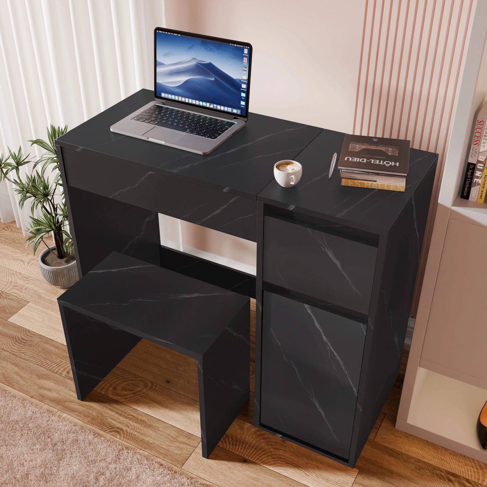 [Black Marble] black marble vanity with mirror down flush serving as a desk with laptop and red book on side