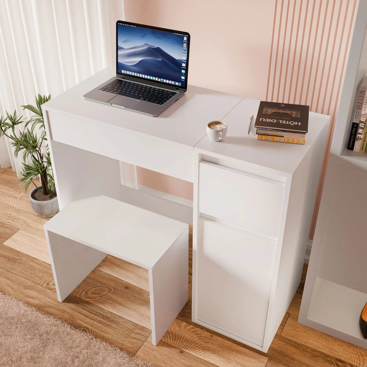 [White] white dressing table with mirror closed flush, used as a desk with a silver laptop on top