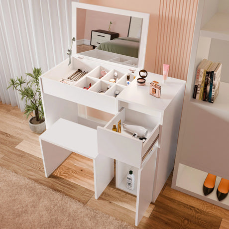 [White] top-down white dressing table view showing makeup compartments under mirror and an open side drawer