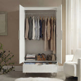 White wardrobe interior with hanging rail and drawer storage compartment open view