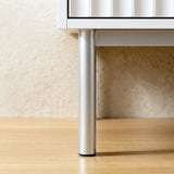 [White] two door wardrobe silver metal leg detail with raised base displaying its unique design and sturdy base