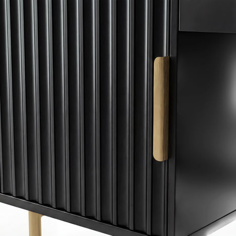Close-up of a black flutrina vanity table with a modern, minimalist design and a gold handle on the drawer