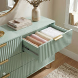 [Sage Green] Interior compartment of wide green drawer showing painted finish and practical depth with golden handles