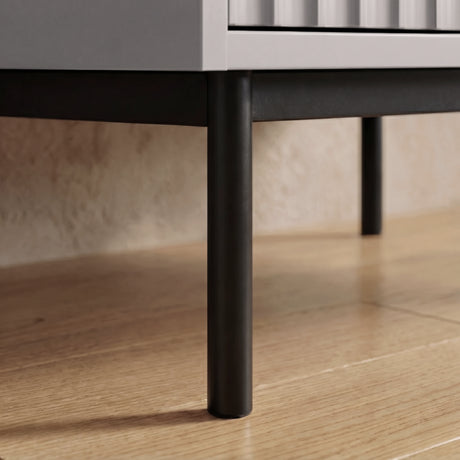 [Grey] flutrina wardrobe raised black metal leg detail supporting cabinet structure placed on a wooden flooring