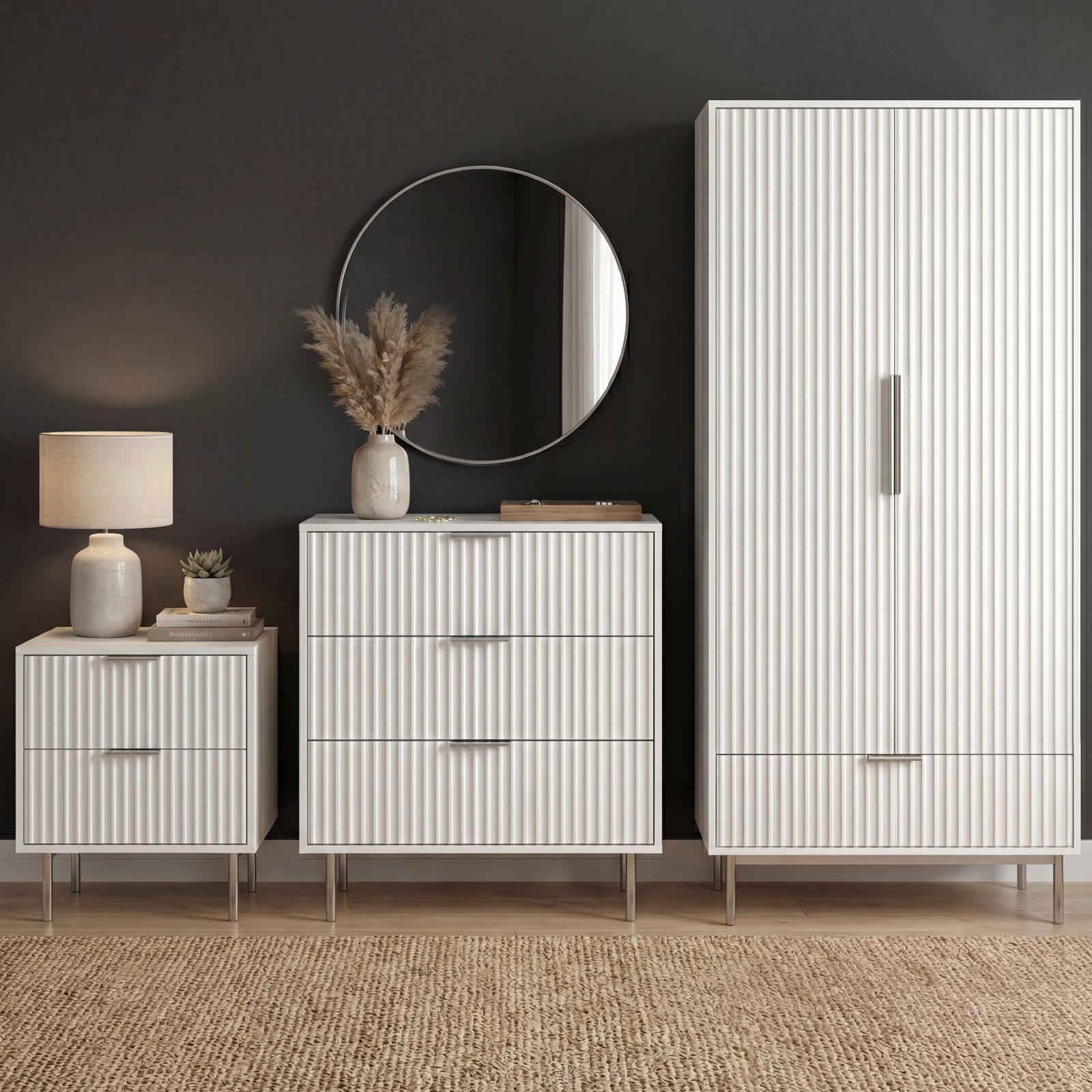 [White] flutrina white wardrobe, chest of 3 drawers and bedside table grouped on a woven rug under a round mirror