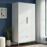 [White] Flutrina 2-door fluted wardrobe in a styled bedroom setting with soft furnishings and natural light