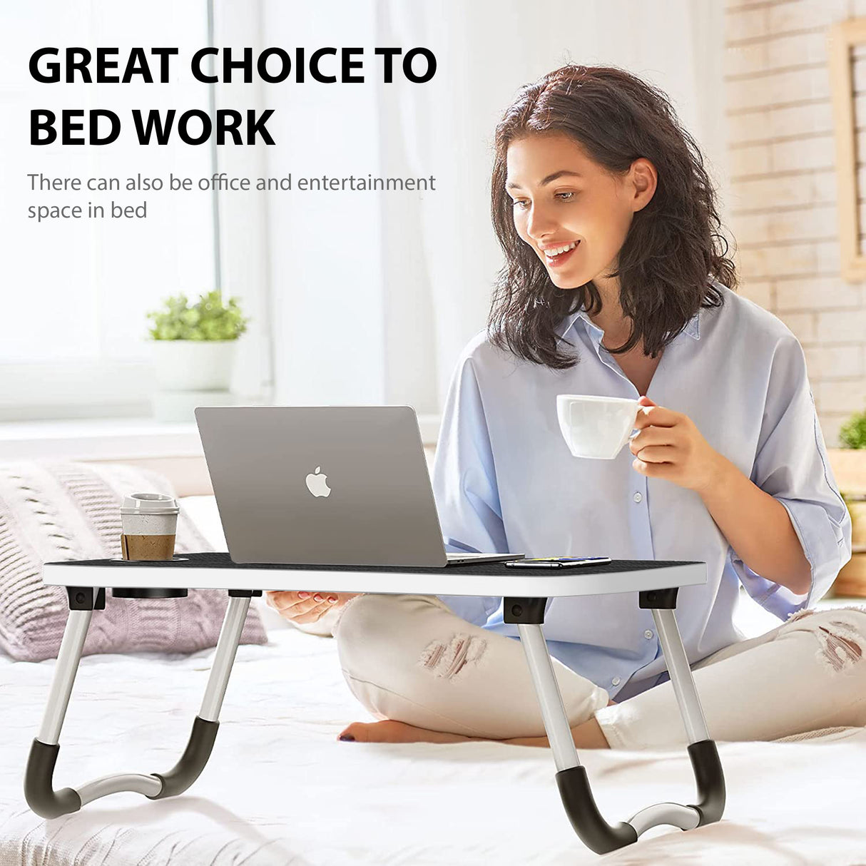 Fold-up laptop table in grey color, compact and easy to store for versatile use.