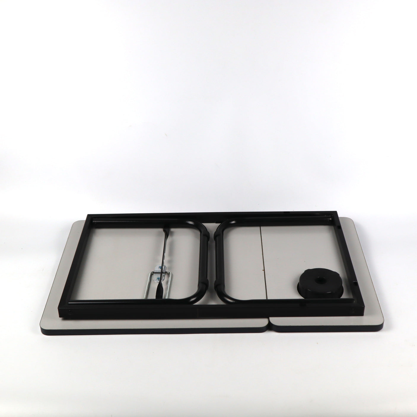 Black foldable bed laptop table with adjustable height, ideal for using your laptop comfortably while relaxing on the bed or sofa.