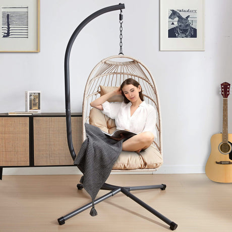 [Beige-Grey] Indoor view of beige-grey garden egg chair with cushion and grey throw blanket