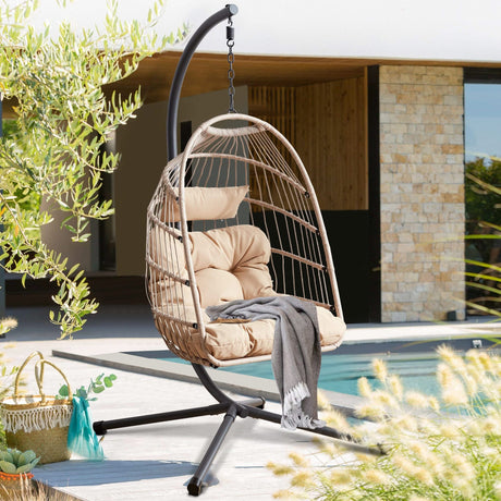 [Beige-Grey] Beige-grey foldable garden egg chair with cushion by swimming pool with stone facade