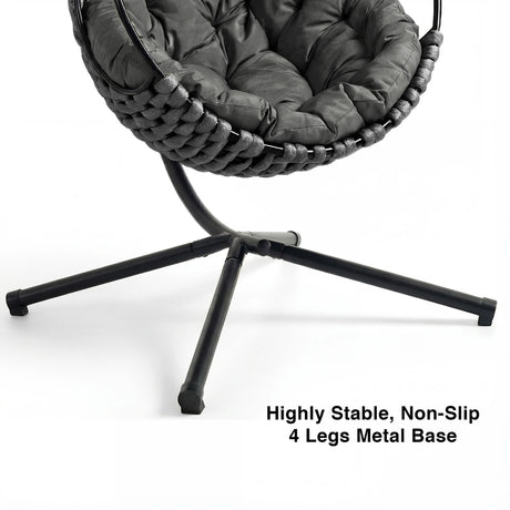 A free-standing dark grey egg chair with 4 leg support for high stability, perfect for both indoor and outdoor spaces.