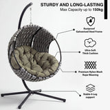 [Grey] A free-standing light grey hanging egg chair with green cushion and labeled features like rustproof frame and thick padding for outdoor durability.