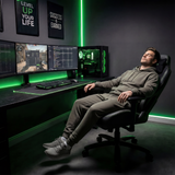 [Black] reclined and resting comfortably in the [Black] Ergonomic Gaming Chair with Headrest within a neon-green lit gaming room.