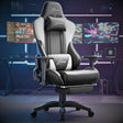 Gaming chair with 'X-Striker' branding in a gaming setup with multiple monitors.
