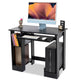 Modern black gaming PC desk with a monitor, keyboard tray, CPU holder, and bookshelf compartments.