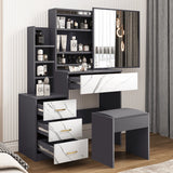 Modern grey dressing table with marble-effect drawers, mirror, and cushioned stool. Features multiple storage shelves and drawers for makeup organization.