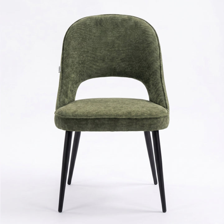 [Set of 4 | Green] Front view of the comfy fabric dining chair with rounded open back, piped seat and four black metal legs.