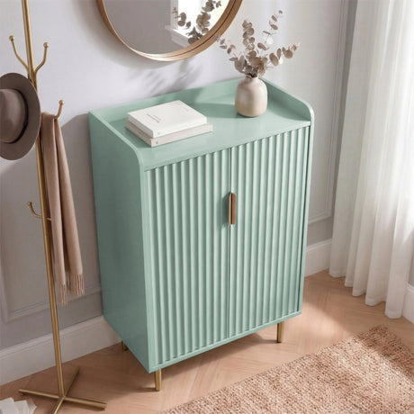 [Green | 60cm] Flutrina shoe cabinet front view in a bright hallway corner with a book and vase on the guard panel top