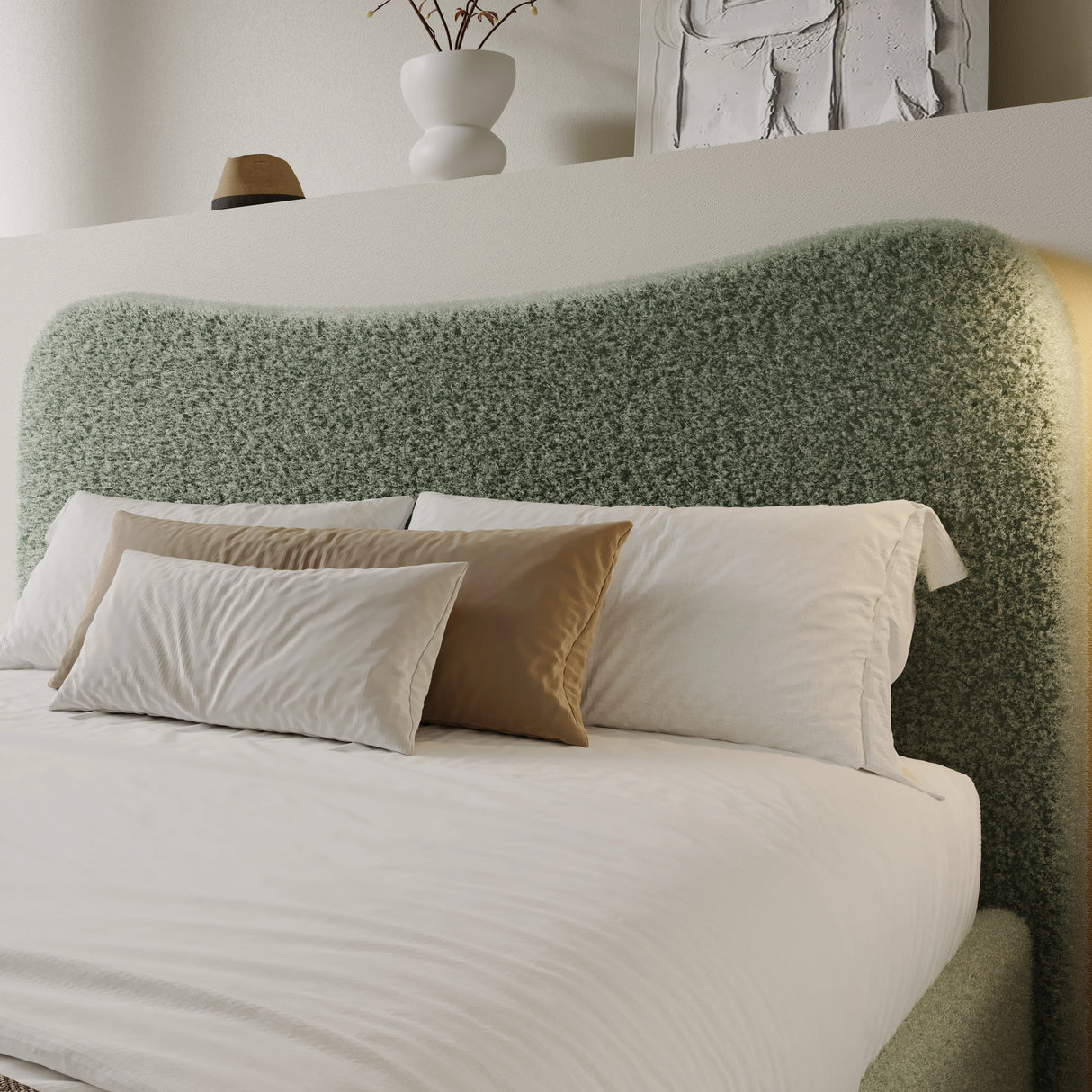  Ottoman bed with curved headboard in light green boucle fabric with plush pillows. Stylish platform bed frame with hidden under-bed storage.