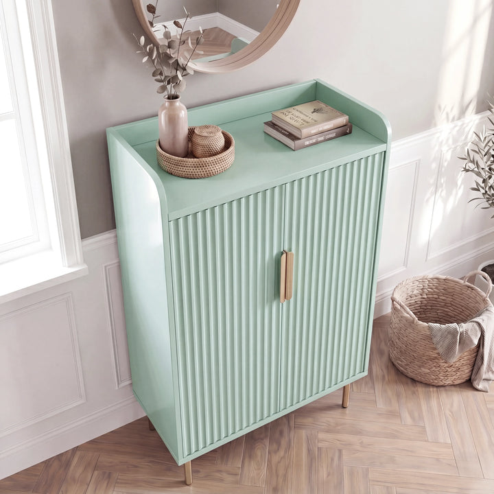 [Green] Fluted Green Painted 5 Tier Shoe Storage angled view showing tray top, books, vase, and ribbed doors