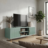 Green TV cabinet with open central shelving and fluted side doors for organized living room media storage.