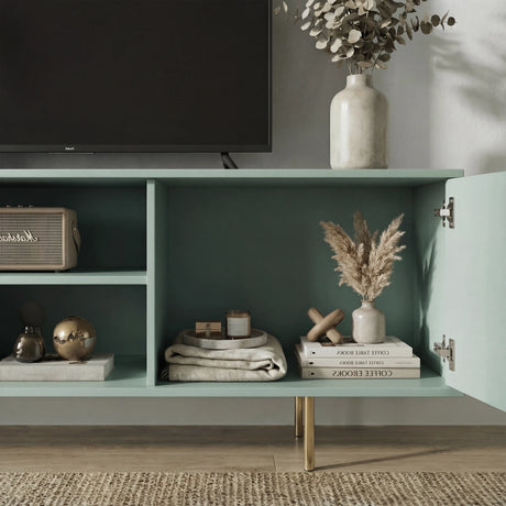 Green TV storage stand with open shelves and fluted doors, perfect for organizing media consoles and decor.