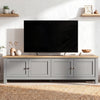 [Grey] 180cm Shaker TV Unit with Storage front view showing four shaker doors with brushed nickel knobs, oak top and floating shelves on white wall behind