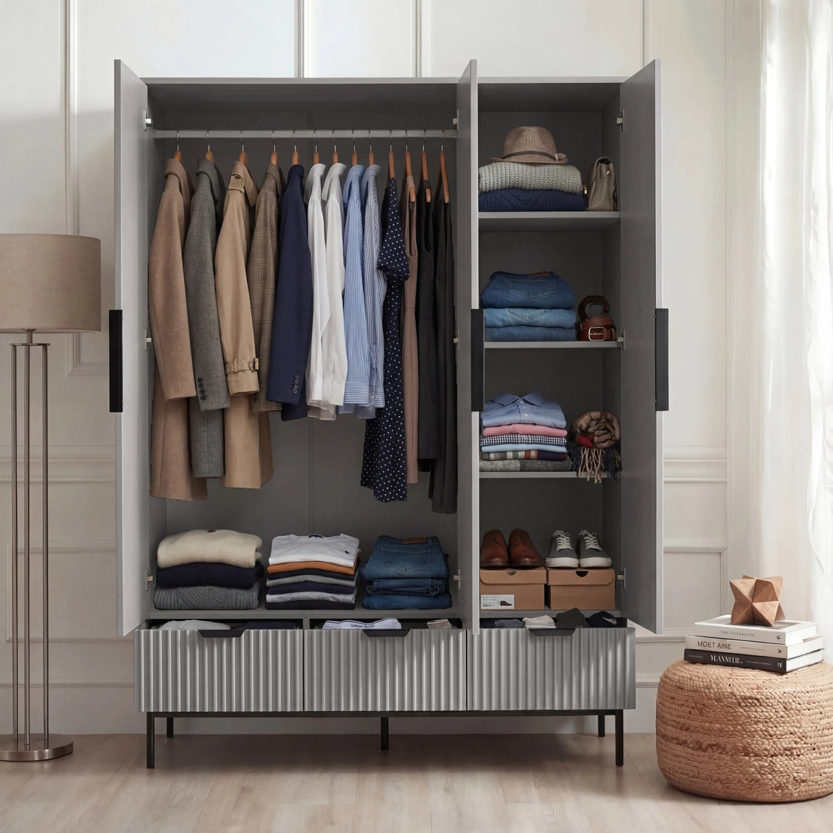 Grey wardrobe internal view with hanging rail, shelves, and three drawers in the lower section