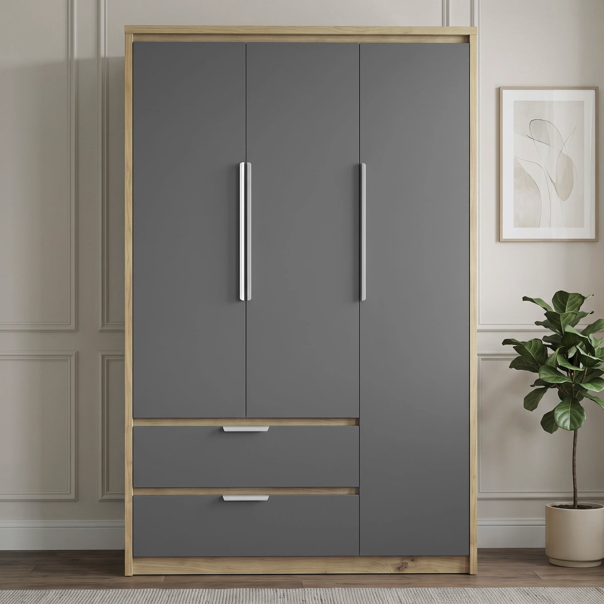 [Grey] A tall three-door wardrobe with  grey doors, silver handles, and two lower drawers with silver pulls, set in a styled room with a wood-look frame, a potted plant, and neutral paneled walls.
