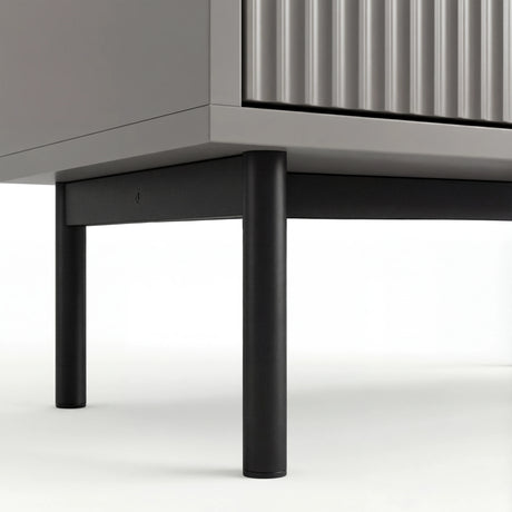 Grey 5 drawer chest, lower section showing silver metal legs and corner frame construction