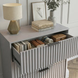 [Grey] flutrina chest top panel styled in bedroom environment highlighting smooth surface