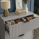 Grey flutrina chest top panel styled in bedroom environment highlighting smooth surface