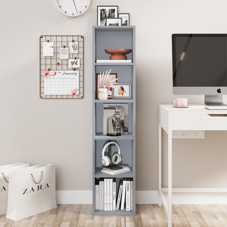 front view of grey tall shelving unit with books and decor, perfect for maximizing vertical space