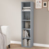 [5 Shelf | Grey] column-style grey-toned bookcase rising along chair by blue-grey painted wall