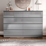 [grey] high gloss 8 drawer chest front view closed in bedroom with mirror and lamp on top