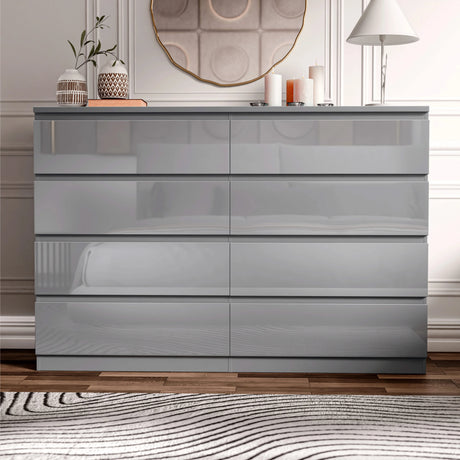 [grey] high gloss 8 drawer chest front view closed in bedroom with mirror and lamp on top