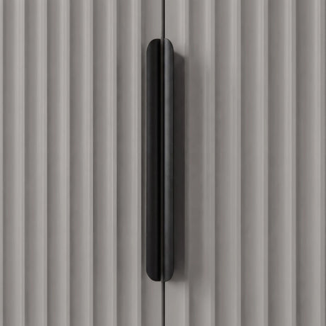 Grey wardrobe handle detail with vertical metal grip mounted on textured panel