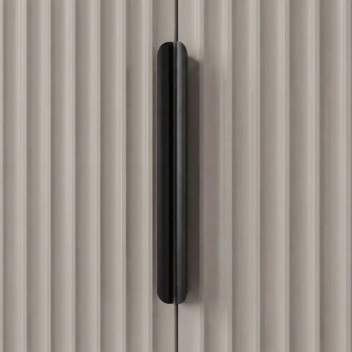 [Grey] wardrobe handle detail with vertical metal grip mounted on textured panel