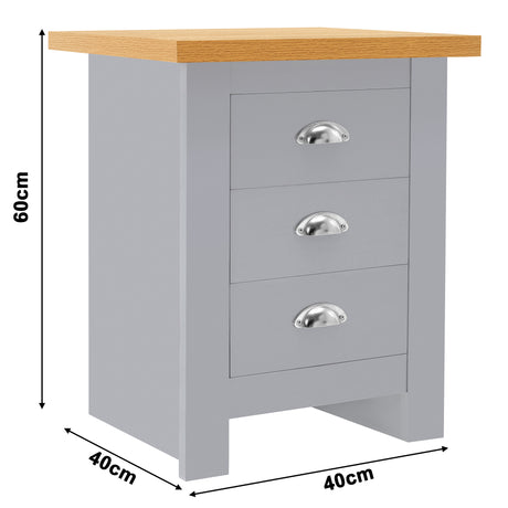 Grey bedside table with three drawers, wooden top, and dimensions of 60cm height and 40cm width.