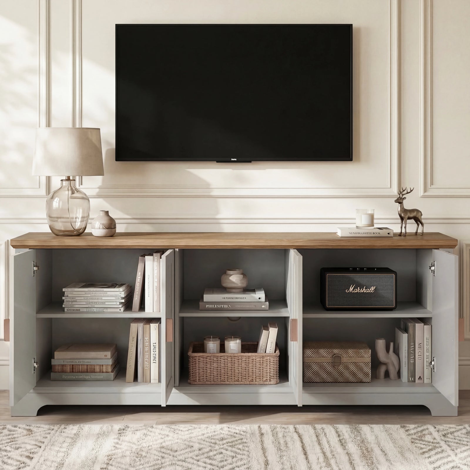 [Grey | 170cm] Bellford TV unit with all doors open in a panelled room showing books, speaker, baskets, and lamp