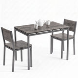 [Grey] Breakfast table set of 2 with grey wood-effect top, two chairs, teapot and mugs on a white background.