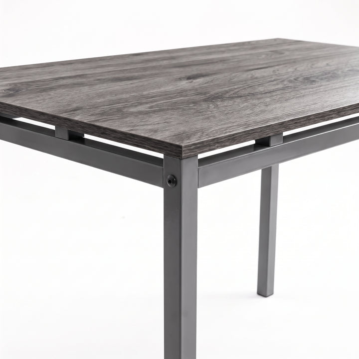 [Grey] Close-up of grey wood-effect breakfast tabletop, spray-painted metal frame, raised supports, square legs & corner bolt
