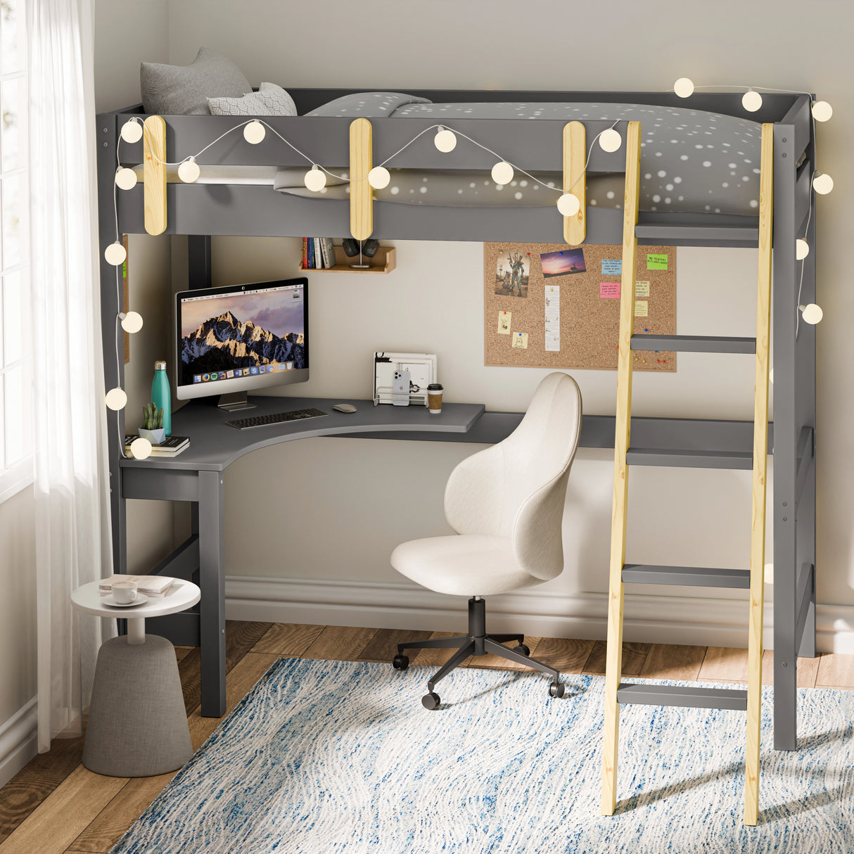 Grey bunk bed with desk placed in the corner of a modern room with a convininet desk underneath