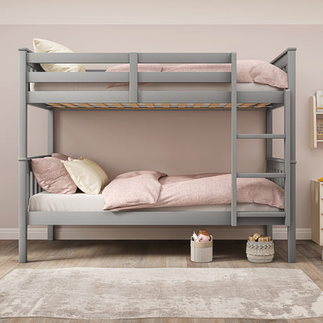 Grey bunk beds UK with stairs and quilt, perfect for maximizing space and comfort.

