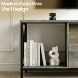 [Grey Oak] Calvera TV unit close-up of left open wire shelf, row of paperback books with a white squiggle ornament