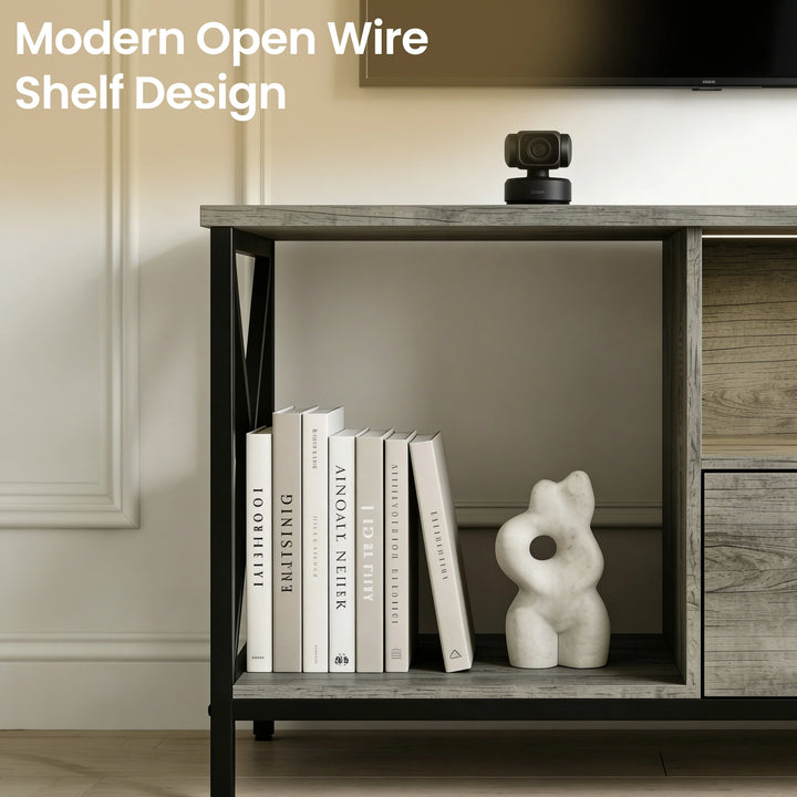 [Grey Oak] Calvera TV unit close-up of left open wire shelf, row of paperback books with a white squiggle ornament
