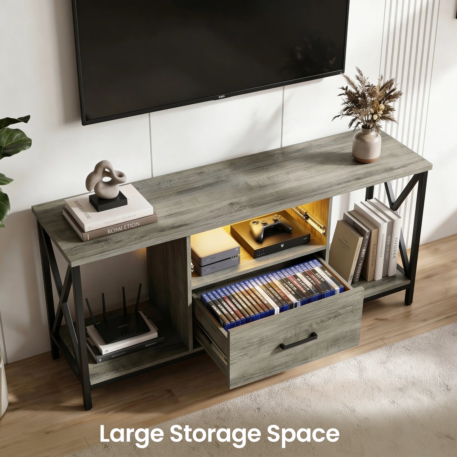 [Grey] Front shot of grey Calvera TV unit, captioned Large Storage Space, drawer open with game cases inside