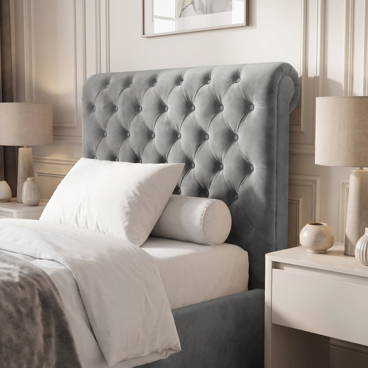 [Small Double | Grey] Close-up view of the deep button-tufted high headboard on the Chesterfield Small Double Ottoman Storage Bed.